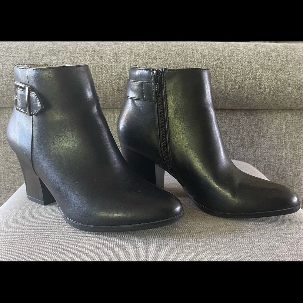 Barely worn, black ankle boots with decorative side buckle.